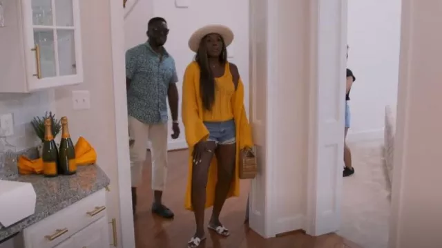 Zara Long Knit Coat Mus­tard Yel­low worn by Wendy Osefo as seen in The Real Housewives of Potomac (S07E10)