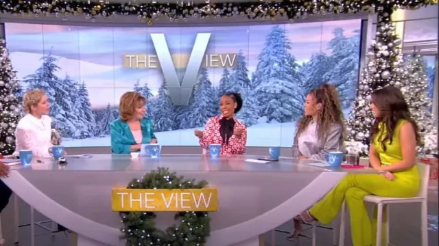 Safiyaa Draped Satin Boot­cut Jump­suit worn by Alyssa Farah as seen in The View on December 15, 2022