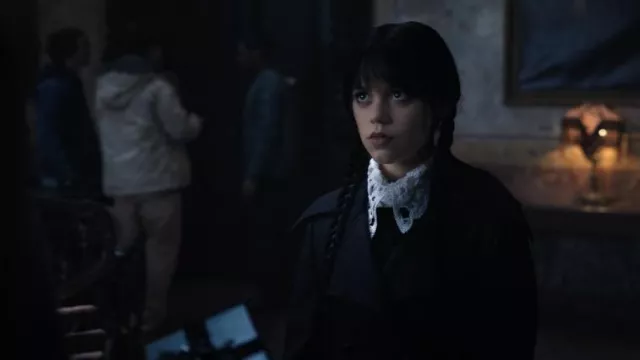 The white shirt with embroidered collar worn by Wednesday Addams (Jenna Ortega) in the series Wednesday (Season 1 Episode 8)