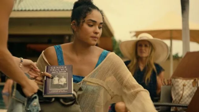 Gender Trouble book by Judith Butler read by Paula (Brittany O'Grady) in The White Lotus (S01E04)