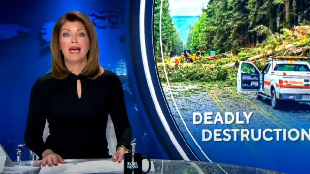 Giorgio Armani Twisted Keyhole Neckline Midi Jersey Dress worn by Norah O'Donnell as seen in CBS Evening News on  January 6, 2023