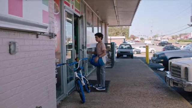 Blue Converse sneakers worn by Dwayne Johnson (Adrian Groulx) in Young Rock (S03E07)