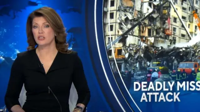 Giorgio Armani Asymmetric Zip Sheath Dress worn by Norah O'Donnell as seen in CBS Evening News on January 16, 2023