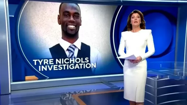 Sergio Hudson Signature Zip-Cuff Crepe Sheath Midi Dress worn by Norah O'Donnell as seen in CBS Evening News on February 7, 2023