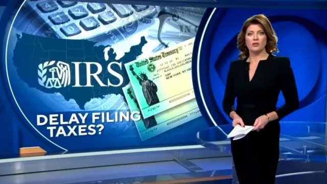 Giorgio Armani Draped Milano Stitch Midi Dress worn by  Norah O'Donnell as seen in CBS Evening News on February 8, 2023