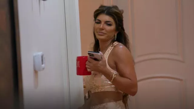 Electric Yoga Foil Chee­tah Print­ed Bra worn by Teresa Giudice as seen in The Real Housewives of New Jersey (S12E11)