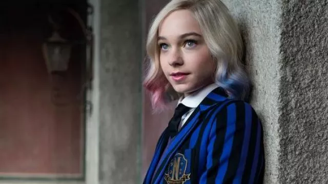 Striped Blue School Blazer and skirt uniform worn by Enid Sinclair (Emma Myers) in Wednesday TV series (Season 1 Episode 1)