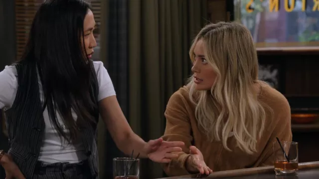 BDG at Urban Outfitters Valeria Cropped V-Neck Sweater worn by Sophie (Hilary Duff) as seen in How I Met Your Father (S02E06)