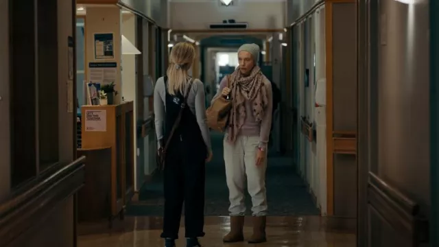 Ugg Clas­sic Short II Boots worn by Laura Oliver (Toni Collette) as seen in Pieces of Her (S01E07)