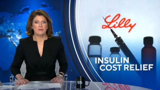 Giorgio Armani Draped Milano Stitch Midi Dress worn by Norah O'Donnell as seen in CBS Evening News on March 1, 2023