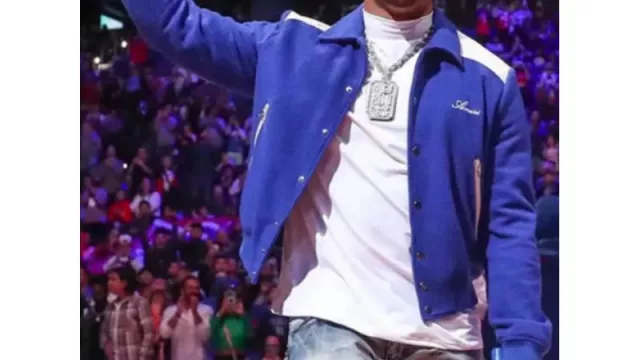 Amiri Varsity Jacket in blue worn by Jalen Hurts  before Sixers VS Spurs NBA Match on October 21, 2022
