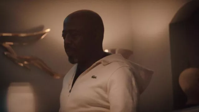 Lacoste hoodie in white worn by Alvin (Donnell Rawlings) as seen in BMF TV show wardrobe (Season 2 Episode 10)
