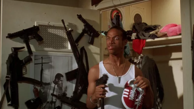 Adidas Gazelle red sneakers held by Loc Dog (Marlon Wayans) in Don't Be a Menace to South Central While Drinking Your Juice in the Hood
