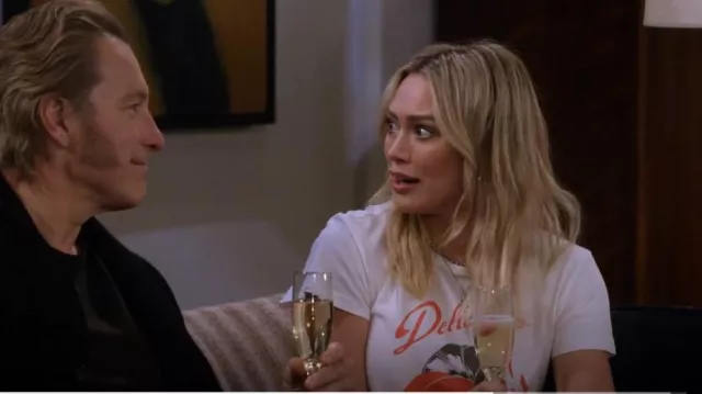 Re/Done Delicious Graphic-Print T-shirt worn by Sophie (Hilary Duff) as seen in How I Met Your Father (S02E10)