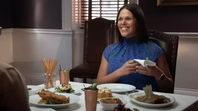 Ann Taylor Floral Smocked Mock Neck Top In Dazzling Blue worn by Dana Jacobson as seen in CBS Mornings on April 10, 2023
