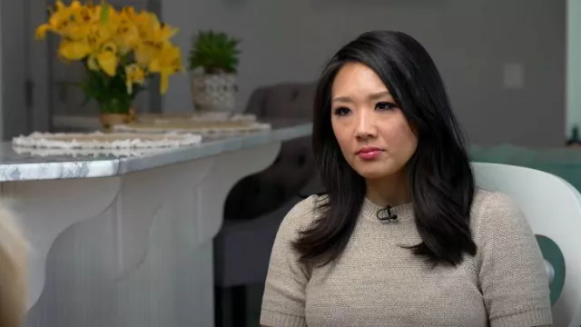 Ann Taylor Marled Puff Sleeve Sweater Tee in Toasted Oat worn by Nancy Chen as seen in CBS Mornings on April 17, 2023