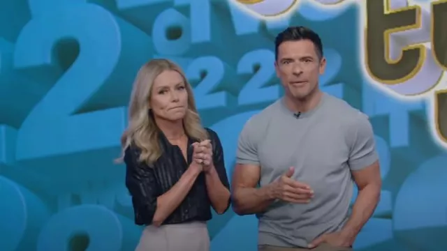 Saint Laurent Tie-Neck Striped Metallic Silk-Blend Shirt worn by Kelly Ripa as seen in LIVE with Kelly and Mark on  April 20, 2023