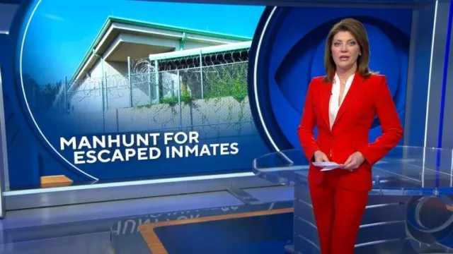 Alexander McQueen Mid-Rise Flared Pants worn by Norah O'Donnell as seen in CBS Evening News on April 26, 2023
