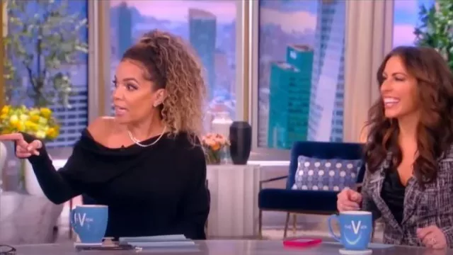 Enza Costa Slouch Shoul­der Sweater worn by Sunny Hostin as seen in The View on  April 26, 2023