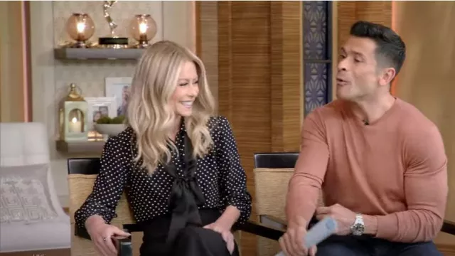 Saint Laurent Tie-Neck Polka-Dot Silk Blouse worn by Kelly Ripa as seen in LIVE with Kelly and Mark on May 2, 2023