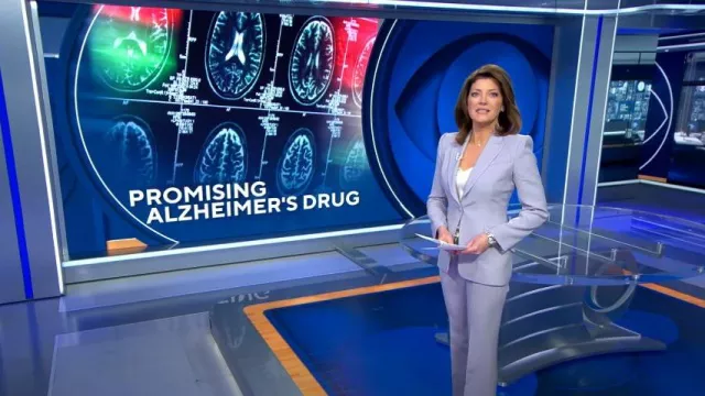 Alexander McQueen Fitted Flap-Pocket Wool-Silk Blazer worn by Norah O'Donnell as seen in CBS Evening News on May 3, 2023