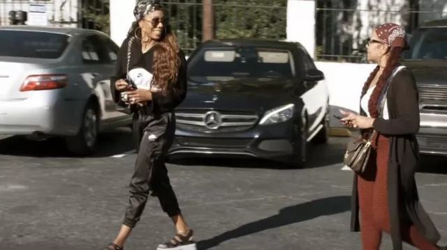 Nike Air Satin Track Pants worn by Sanya Richards-Ross as seen in The Real Housewives of Atlanta (S15E01)