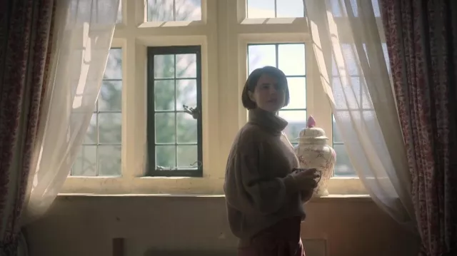 The green mug with leaf print held by Harper (Jessie Buckley) in the movie Men