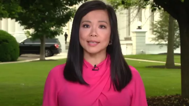 Shein Unity Cross Wrap Front Bishop Sleeve Top worn by Weijia Jiang as seen in CBS Mornings on June 8, 2023