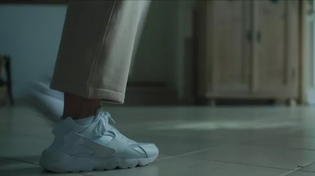 Nike Air Huarache Sneakers in white worn by Kristin (Toni Collette) as seen in Mafia Mamma