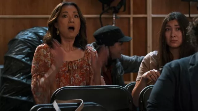 Chenault Flo­ral Peas­ant Top worn by Joyce Wong (Jae W. Suh) as seen in Never Have I Ever (S04E08)