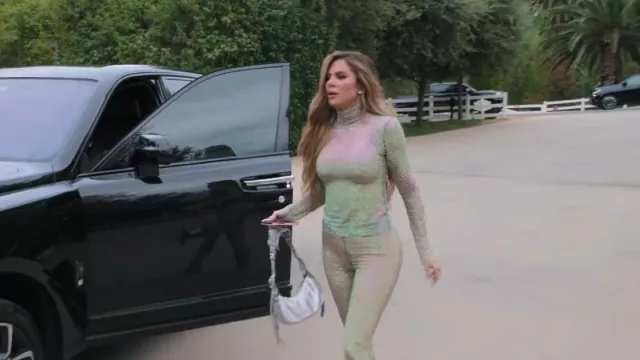MSGM Silver Holographic Sequin Turtleneck worn by Khloé Kardashian as seen in The Kardashians (S03E06)