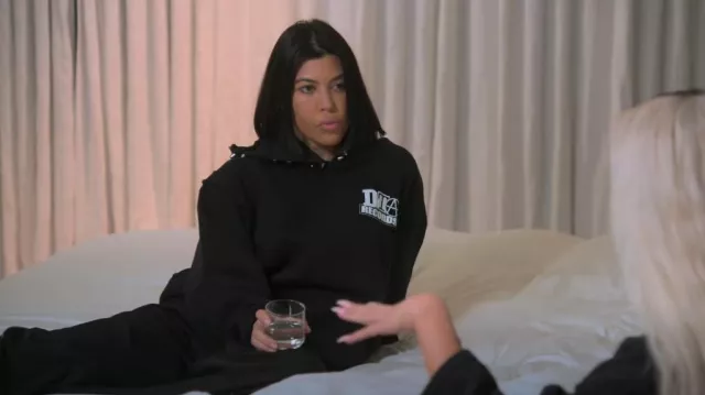 DTA Records Studded Hoodie worn by Kourtney Kardashian as seen in The Kardashians (S03E07)