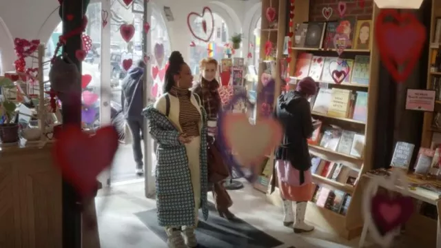 Wales Bonner Striped Roll Neck Sweater worn by Dr. Nya Wallace (Karen Pittman) as seen in And Just Like That… (S02E07)