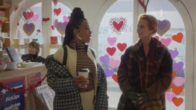 Canada Goose x Reformation printed parka worn by Dr. Nya Wallace (Karen Pittman) in And Just Like That… (Season 2 Episode 7)