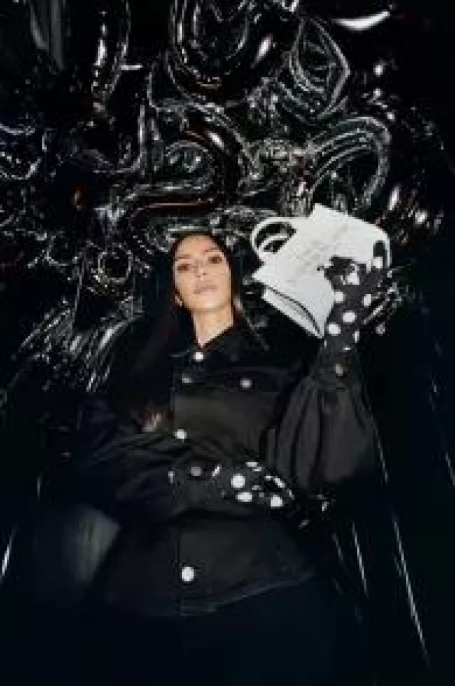 Marc Jacobs The Leather Small Tote Bag worn by Kim Kardashian in Marc Jacobs Fall 2023 Campaign on August 9, 2023