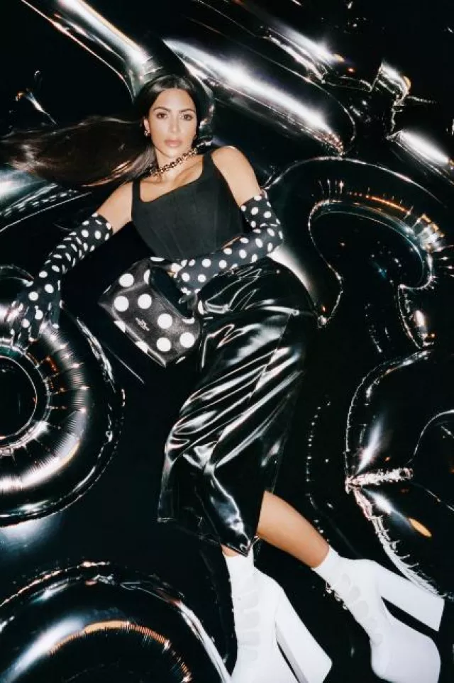 Marc Jacobs The Spots Mini Sack Bag worn by Kim Kardashian in Marc Jacobs Fall 2023 Campaign on August 9, 2023