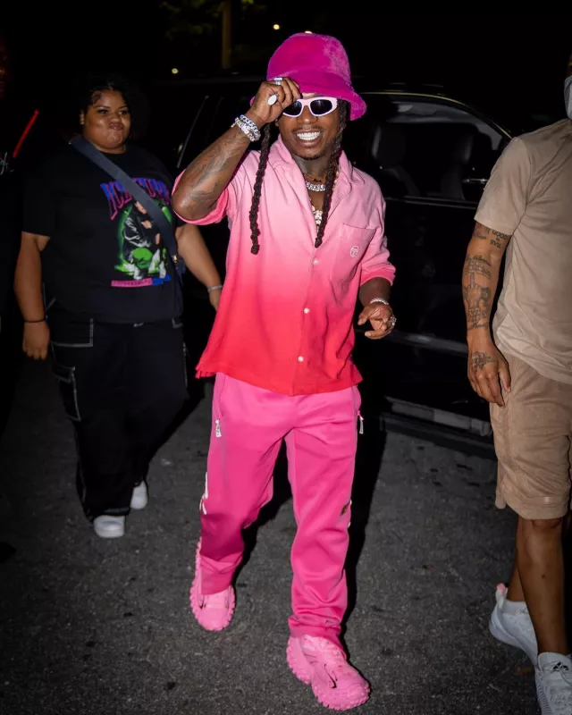 Balenciaga Eyewear Pink Cat Eye Dy­nasty Sun­glass­es worn by Jacquees on the Instagram account @jacquees