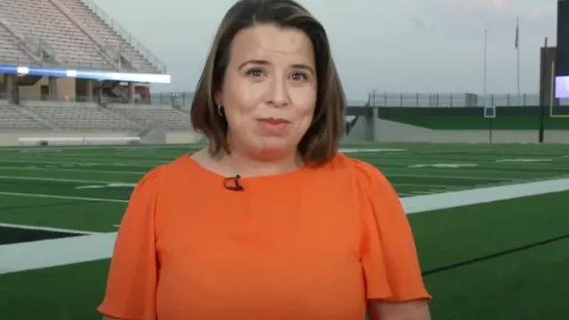 Ann Taylor Mixed Media Angel Sleeve Top In Summer Orange worn by Andrea Lucia as seen in CBS Mornings on  August 25, 2023