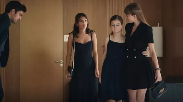 Reformation Nikita Midi en noir porté par Erin Carter (Evin Ahmad) comme on le voit dans Who Is Erin Carter? (S01E06)