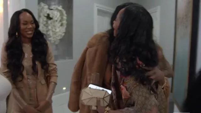 Gucci Supreme Mono­gram Gi­ant Flo­ral Scarf worn by Courtney Bruce as seen in The Real Housewives of Atlanta (S15E15)