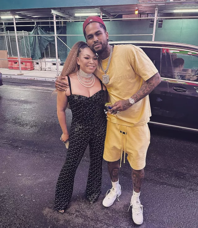 Fear of God Tus­can Yel­low T-Shirt worn by Dave East on his Instagram account @daveeast