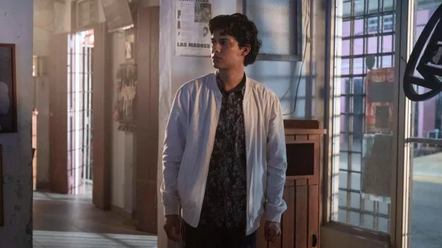 The white jacket worn by Miguel Diaz (Xolo Maridueña) in the series Cobra Kai (Season 4)