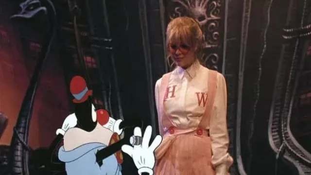 Embroidered H and W red letters on the shirt of Holli Would (Kim Basinger) in Cool World movie
