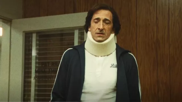 Adidas Originals Beck­en­bauer Track Jack­et worn by Pat Riley (Adrien Brody) as seen in Winning Time: The Rise of the Lakers Dynasty (S02E04)