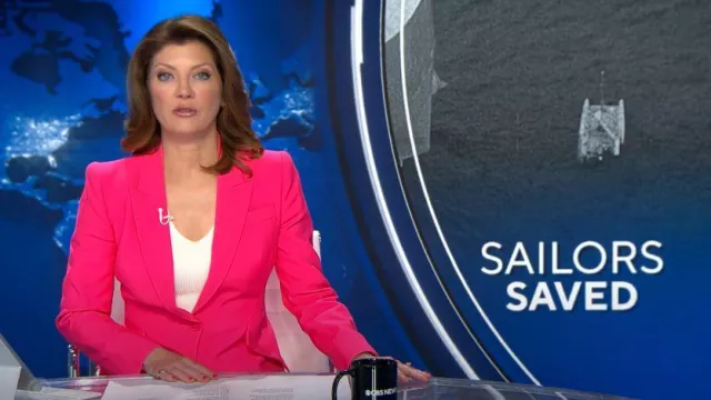 Alexander McQueen Single-Breasted Tailored Blazer Jacket in Neon Pink worn by Norah O'Donnell as seen in CBS Evening News on September 6, 2023