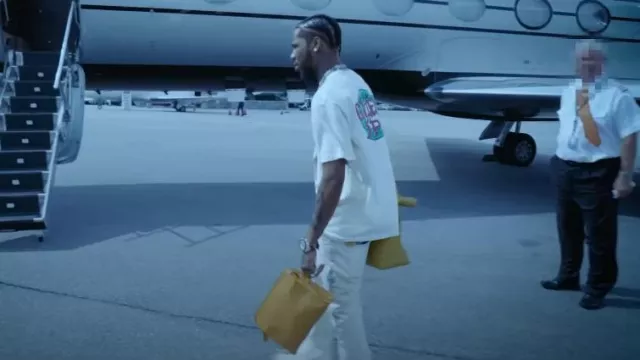 Goyard Yellow Jouvence Toiletry Bag worn by Key Glock in Penny (Official  Music Video)