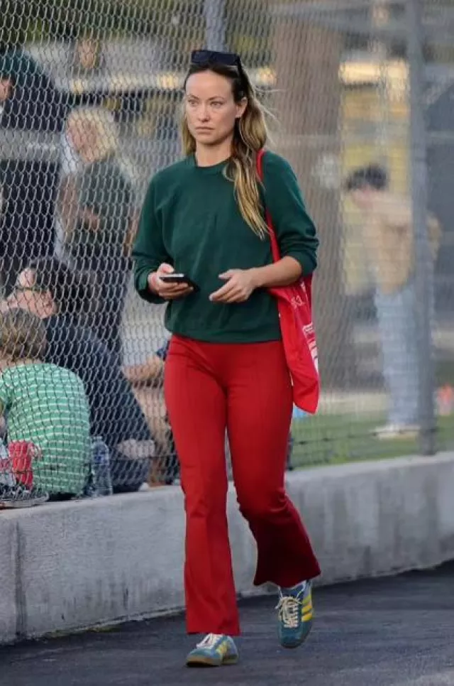 Kwaidan Editions Flared High Waisted Trousers Red worn by Olivia Wilde