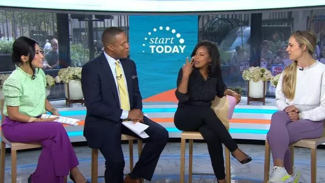 Reiss Fluid Flare Trousers worn by Vicky Nguyen as seen in Today on  September 11, 2023