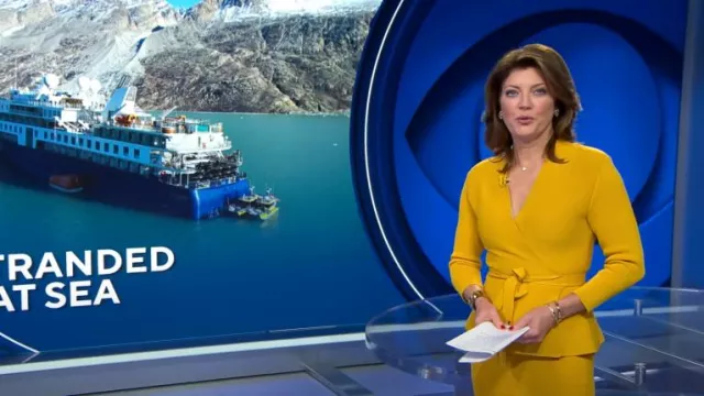 New York & Company Estelle Cardigan Eva Mendes Collection worn by Norah O'Donnell as seen in CBS Evening News on September 14, 2023