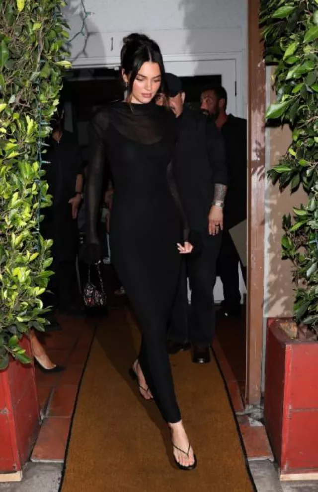 Blumarine Long Knit Dress with Rose Decor worn by Kendall Jenner at Giorgio Baldi Post on August 19, 2023